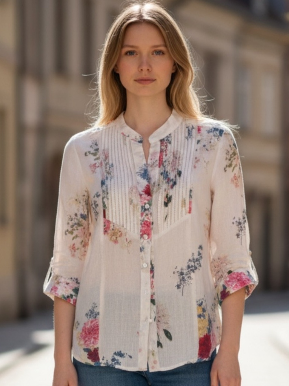 Magazine cream-colored button-up blouse with pleated front detailing size small
